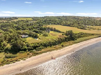 an aerial view of a beach with a person on it at Holiday Home Elizabeth - 150m to the fjord by Interhome in Fur