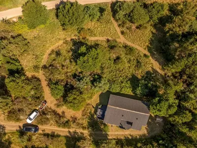 an overhead view of a house in the forest at Holiday Home Marisol - 250m to the fjord by Interhome in Fur