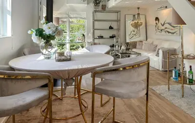 a living room with a table and chairs at Gorgeous Home In Farsø With Wifi in Farsø