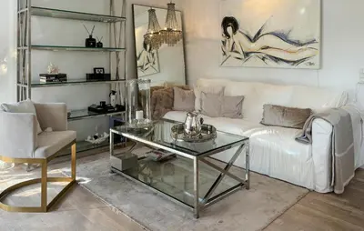 a living room with a white couch and a glass table at Gorgeous Home In Farsø With Wifi in Farsø
