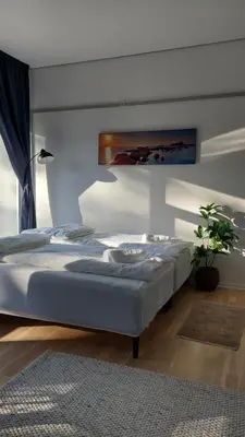 a bedroom with two beds in a room at Antonia s quality apartment 1 in Viborg