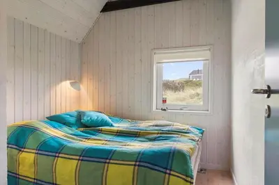 a bed in a room with a window at BL1120-Saltum-Kohlsvej-15 in Saltum
