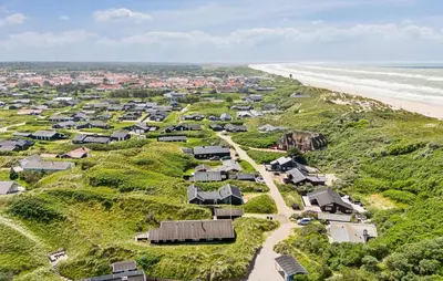 an aerial view of a village next to the beach at Beautiful Home In Blokhus With Sauna in Blokhus
