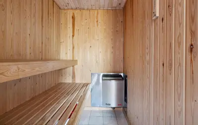 a inside of a sauna with a cooler in it at Beautiful Home In Blokhus With Sauna in Blokhus