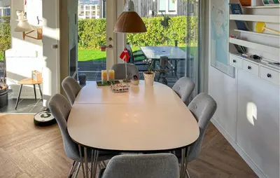 a dining room with a table and chairs at 3 Bedroom Gorgeous Home In Hurup Thy in Doverodde