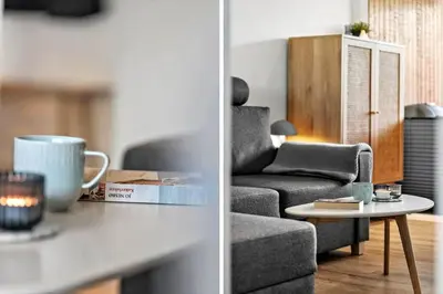 a living room with a couch and a table at G346-Lemvig-Vinkelhagevej-46 in Lemvig