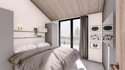a bedroom with a bed and a large window at BL1127-Saltum-Bondagervej-23 in Saltum