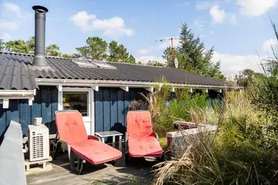 a group of chairs sitting outside of a house at 1334-Thisted-Ingerslevvej-14 in Thisted