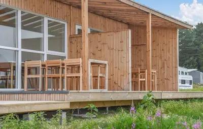 a house being constructed with wooden walls and windows at Gorgeous Home In Hanstholm With House Sea View in Hanstholm