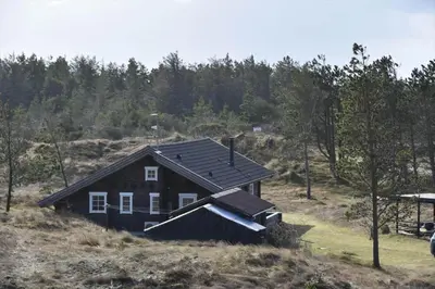 a house sitting on top of a hill at 1366-Bedsted-Thy-Lyngbyvej-56 in Bedsted Thy
