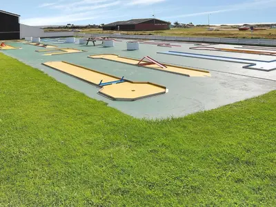 a row of empty trays on a field of grass at Apartment Benthe - 100m to the fjord by Interhome in Vestervig