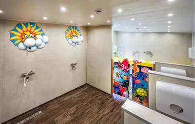 a bathroom with three lights on the wall at Gorgeous Home In Hanstholm With Swimming Pool in Hanstholm