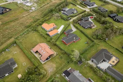 an aerial view of a yard with houses at LK2201-Lokken-Kristavej-45 in Grønhøj