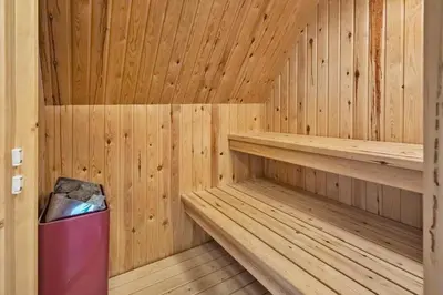 a wooden sauna with a trash can in it at 534-Lemvig-Lokkevej-13 in Lemvig