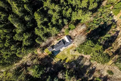 an aerial view of a house in the middle of a forest at JB238-Brovst-Baunehojvej-37 in Brovst
