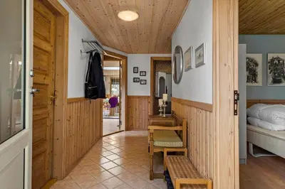 a hallway with a bed and a wooden ceiling at JB404-Fjerritslev-Jesper-Jensensvej-9 in Slettestrand