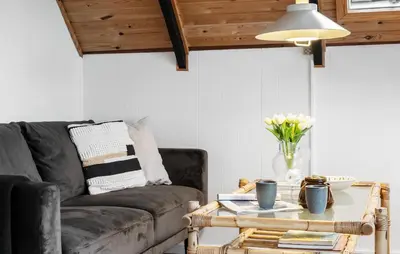 a living room with a couch and a coffee table at 2 Bedroom Pet Friendly Home In Thisted in Thisted