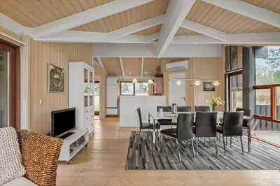 a dining room with a table and chairs at JB372-Fjerritslev-Ronnevej-3