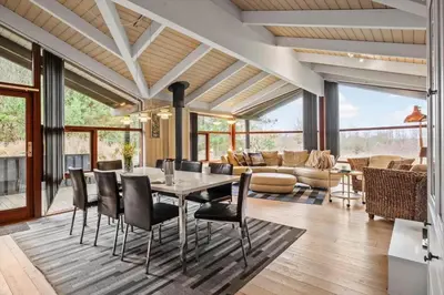a dining room with a table and chairs at JB372-Fjerritslev-Ronnevej-3