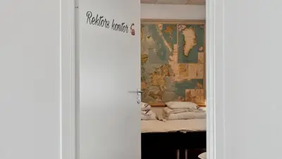 a door leading to a room with a bed at Villavilla 645 - Hostrup Strand, Limfjorden in Spottrup