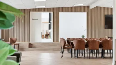 a conference room with a table and chairs at Villavilla 645 - Hostrup Strand, Limfjorden in Spottrup