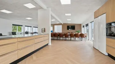 an office with a conference room with tables and chairs at Villavilla 645 - Hostrup Strand, Limfjorden in Spottrup