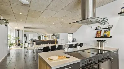 an open kitchen and dining room with white walls at Villavilla 637 - Vorupør, Nordjylland in Snedsted
