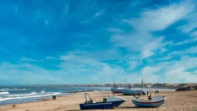 a group of boats sitting on the beach at Villavilla 637 - Vorupør, Nordjylland in Snedsted