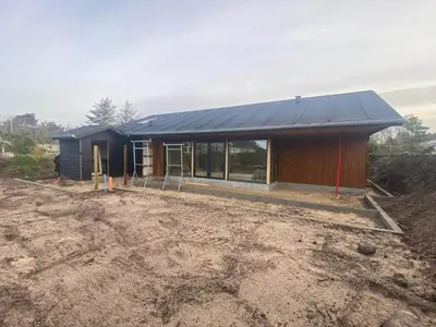 a house being constructed with a solar roof at BL1149-Blokhus-Paa-Bakken-12 in Blokhus