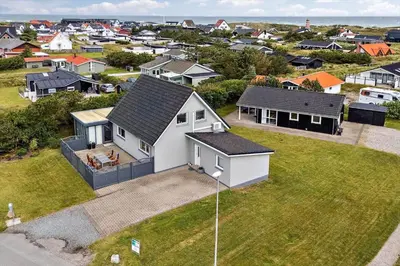 an aerial view of a house in a residential neighborhood at 1375-Thisted-Nordsovej-15 in Nørre Vorupør