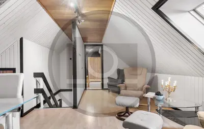 a living room with a glass table and chairs at 2 Bedroom Pet Friendly Home In Øster Assels in Øster Assels