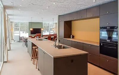 a kitchen with a large island with two sinks at Nice Home In Skals With Wifi in Skals