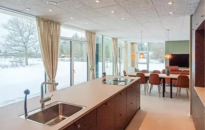 a kitchen with a sink and a large window at Nice Home In Skals With Wifi in Skals