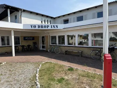 a building with a sign that reads yo drop inn at VØ Budget Drop Inn in Thisted