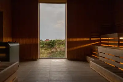 an empty room with a door with a view at Feriecenter Slettestrand in Fjerritslev