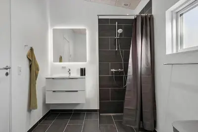 a bathroom with a shower and a sink at JB376-Fjerritslev-Egevej-14