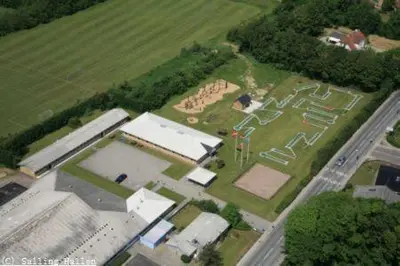 an aerial view of a building with a soccer field at Roslev Vandrerhjem-Hostel in Roslev