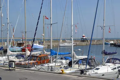 a group of boats docked in a harbor at Danhostel Thyborøn in Thyborøn