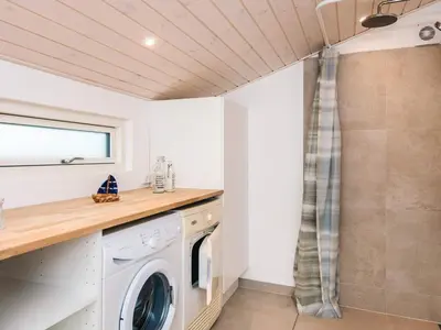 a laundry room with a washer and dryer at 12 person holiday home in Harboøre-By Traum in Vrist