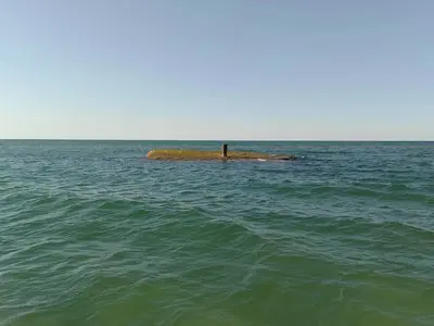 a person standing on an island in the ocean at 8 person holiday home in Fjerritslev-By Traum in Torup Strand