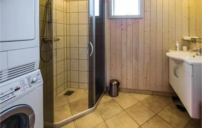 a shower with a glass door in a bathroom at Three-Bedroom Holiday Home In Fjerritslev in Fjerritslev