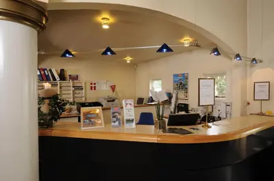 an office with a desk with a counter top at Hotel Limfjorden in Thisted