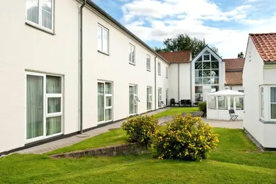 a view of the courtyard of a house at Golf Hotel Viborg in Viborg