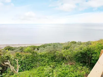 a view of the ocean from a bluff at 4 person holiday home in Struer in Struer