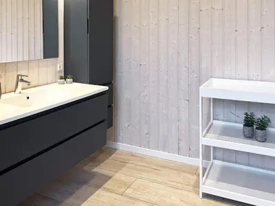 a bathroom with a sink and a white counter at 8 person holiday home in Roslev-By Traum in Roslev