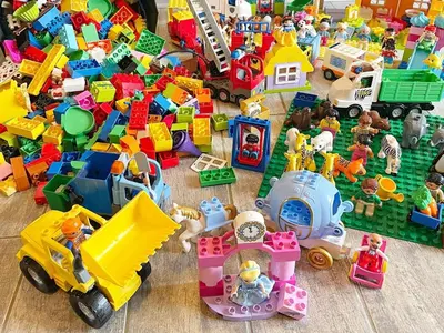 a pile of lego toys sitting on a floor at Luxury Retreat by Hostrup Beach - By Traum Ferienwohnungen in Spottrup