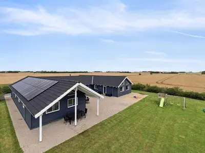 an overhead view of a house with a solar roof at Luxury Retreat by Hostrup Beach - By Traum Ferienwohnungen in Spottrup