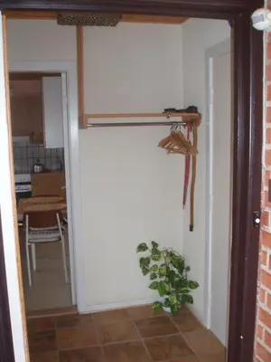 a room with a door with a plant in it at Glyngøre Bed & Breakfast II in Glyngøre