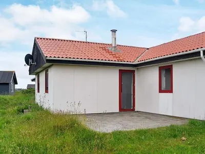 a white house with a red roof at 10 person holiday home in Harboøre-By Traum in Harboør