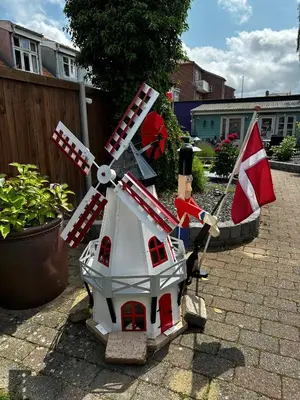 a model of a windmill sitting on a patio at Oasen in Viborg